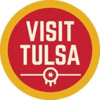 Visit Tulsa logo, promoting tourism and travel to the vibrant city of Tulsa, Oklahoma
