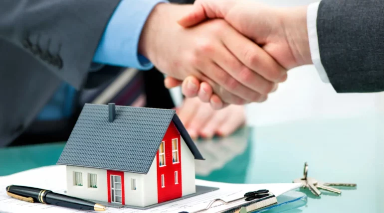 shaking hands with customer after contract signature